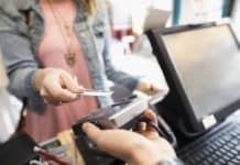 Shopper paying with contactless card