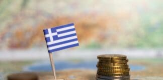 greek flag and coins on map, source: Shutterstock