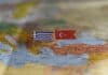 Greece-Turkey flags on map, source: Shutterstock