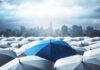 Insurance umbrella concept, source: Shutterstock