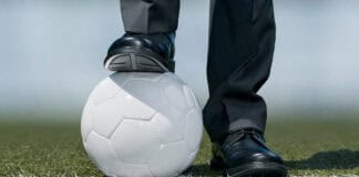Businessman-investor ready to play football, source: Shutterstock