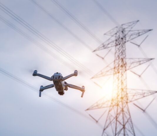 drone surveying pylons, source: Shutterstock