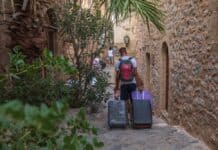 Tourist with suitcases arrives in Monamvasia, source: Shutterstock
