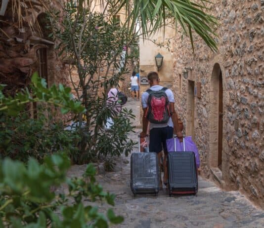 Tourist with suitcases arrives in Monamvasia, source: Shutterstock