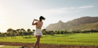 woman playing golf